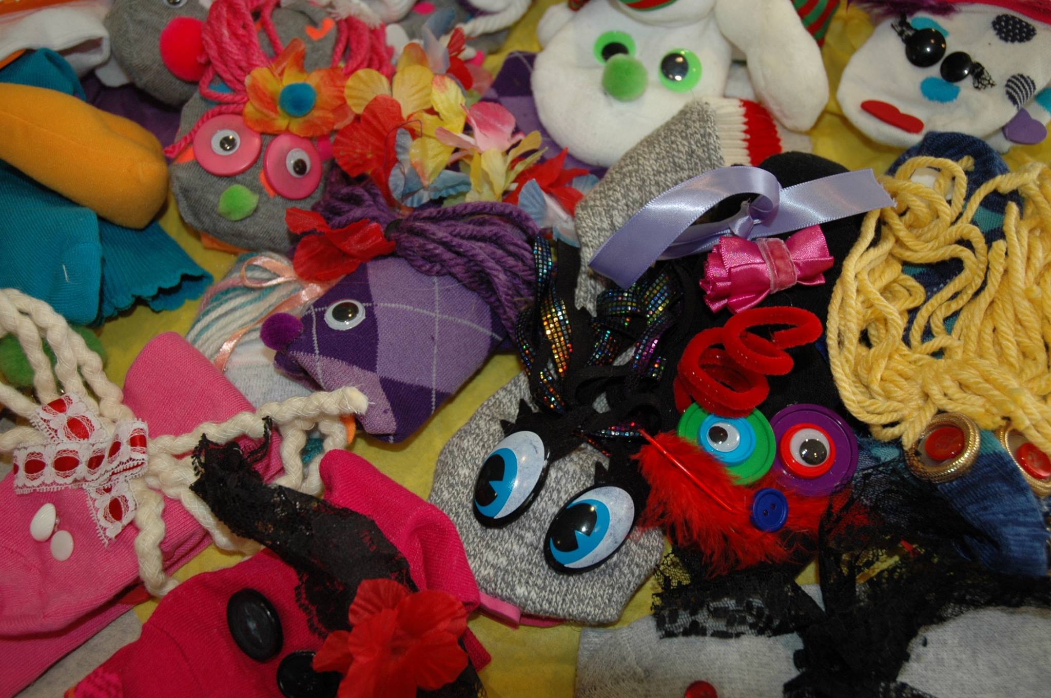 Companies Team-Build While Giving Back Through Sock Puppets with a Heart  - Michelee Puppets